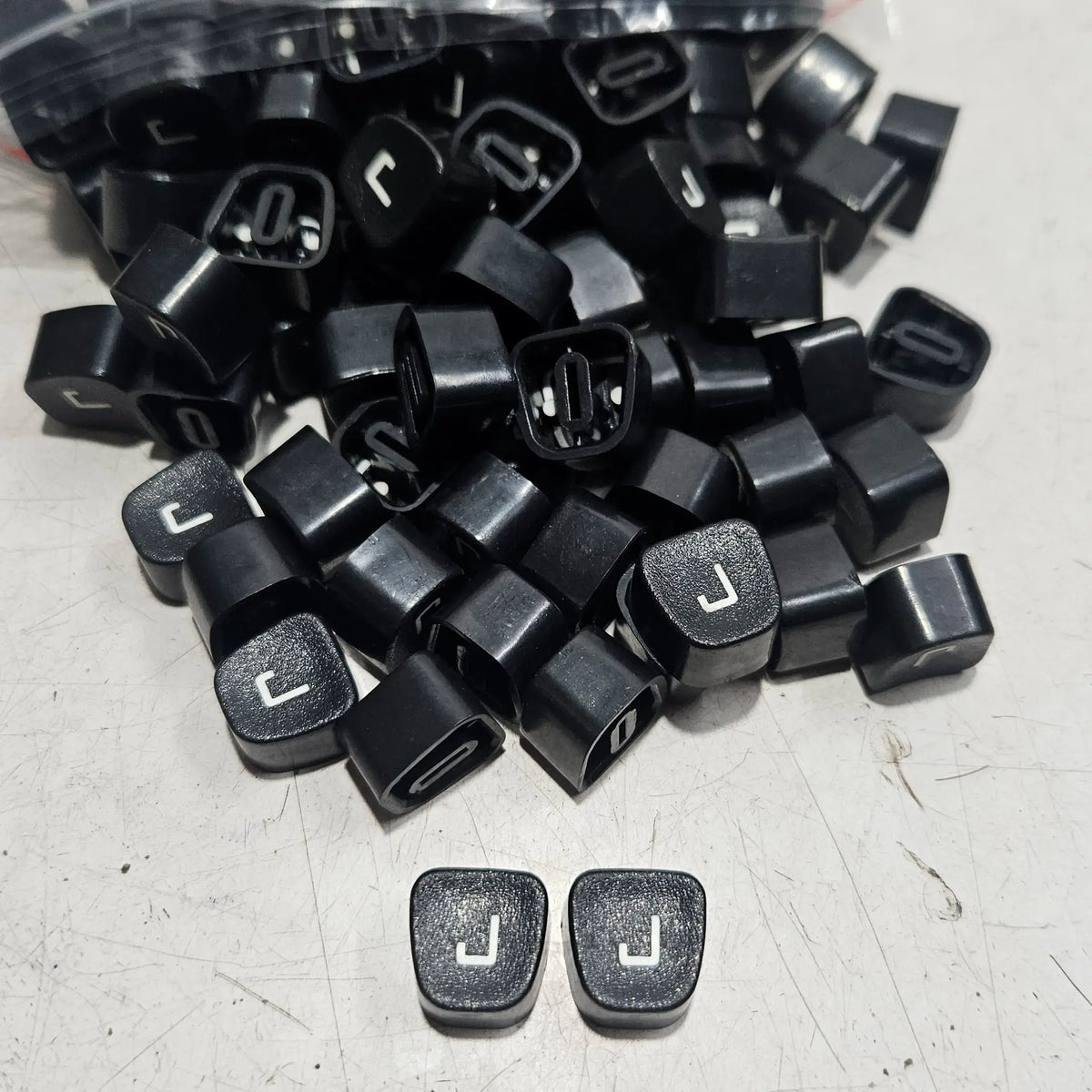 Black Godrej English J typewriter loose keytops for manual typewriter repair, typing machine spare parts at RR Typewriter Mart