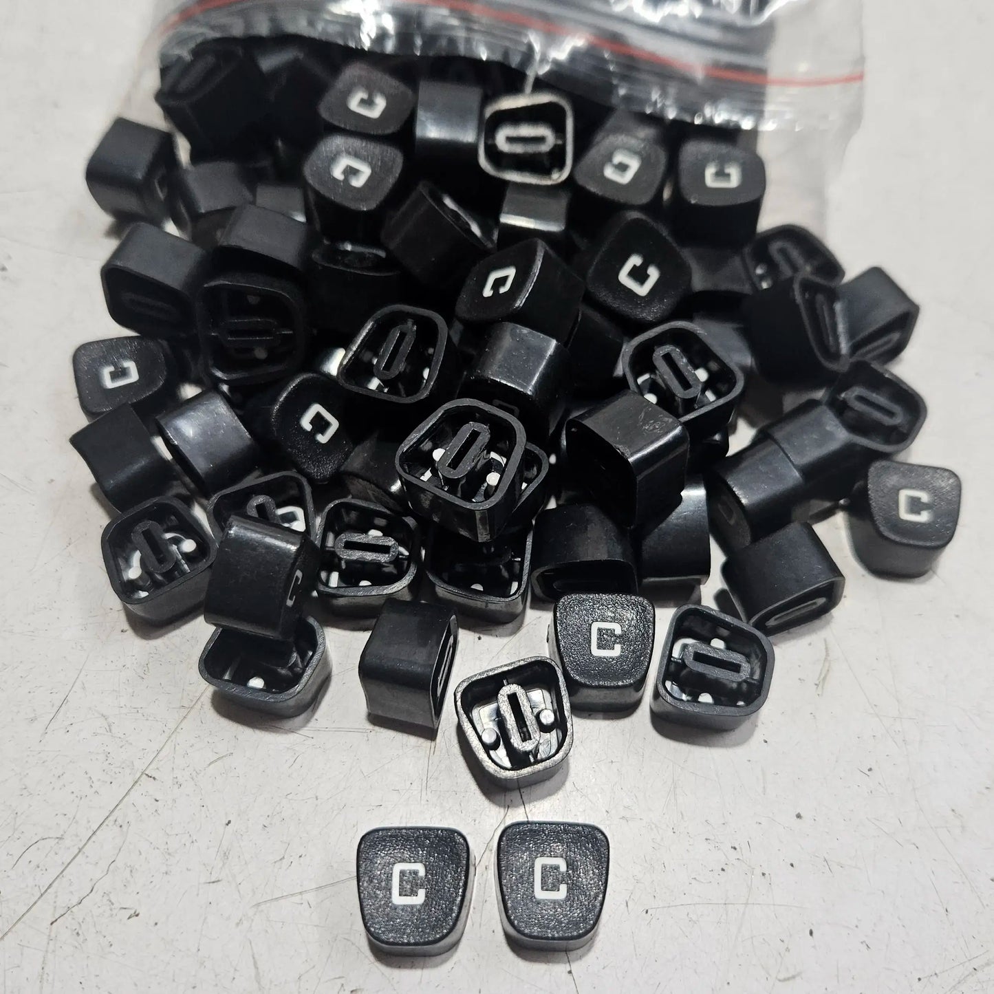 Black Godrej English C typewriter loose keytops for manual typewriter repair, restoration and typing machine spare parts