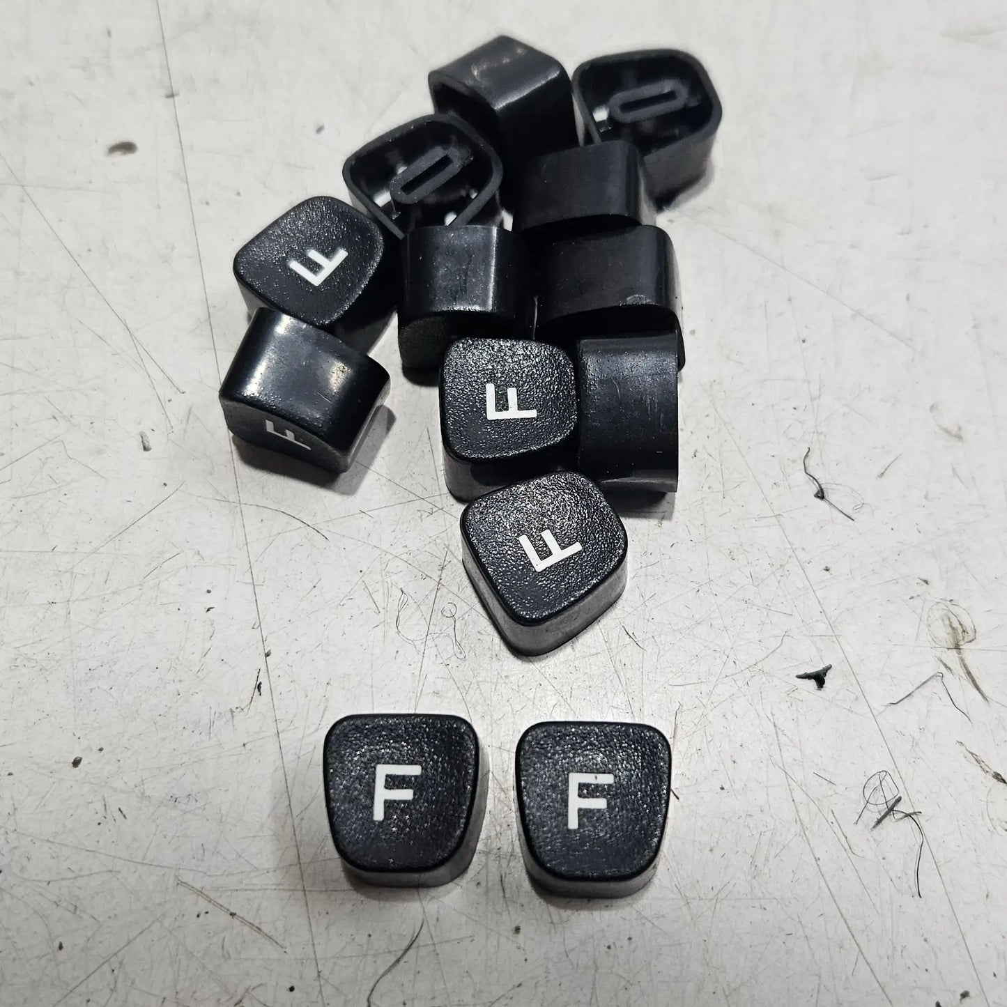 Black Godrej English F typewriter loose keytops for manual typewriter repair and restoration at RR Typewriter Mart