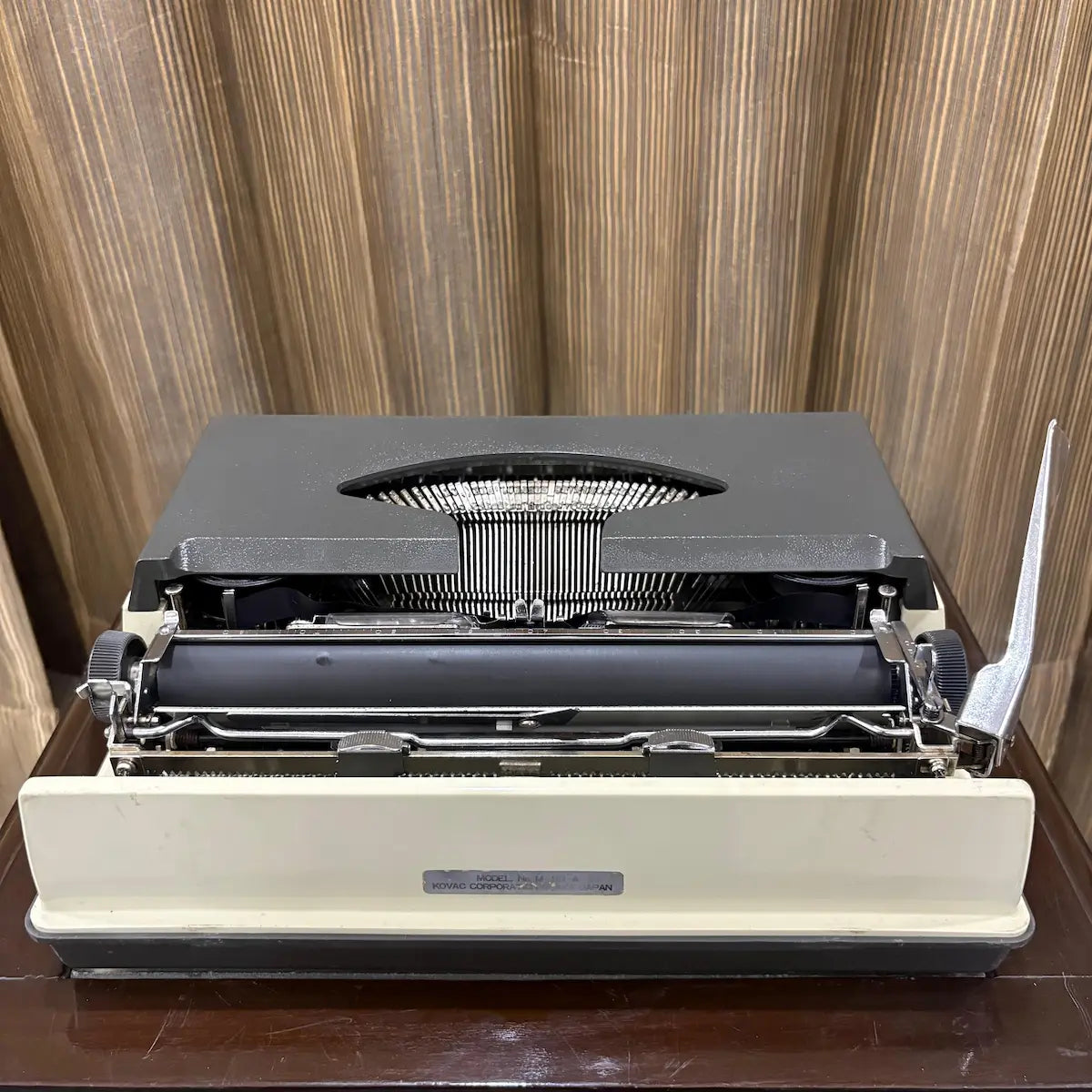 Kovac manual English typewriter in mint unused condition, featuring a factory original two tone grey and white finish | RR Typewriter Mart