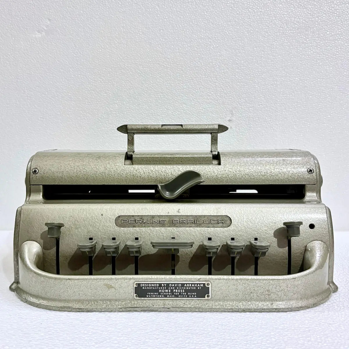Perkins Braille Typewriter with mint-condition textured gold paint, professionally serviced for Braille users in India by RR Typewriter Mart