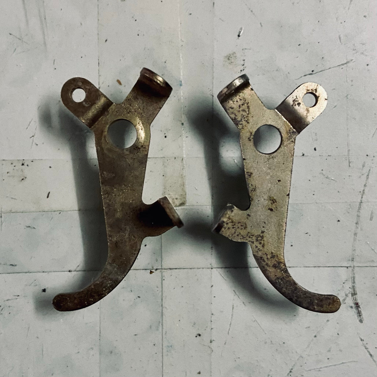 Godrej typewriter ribbon feed stop pawl assembly vintage typing machine spare part for maintenance and repair