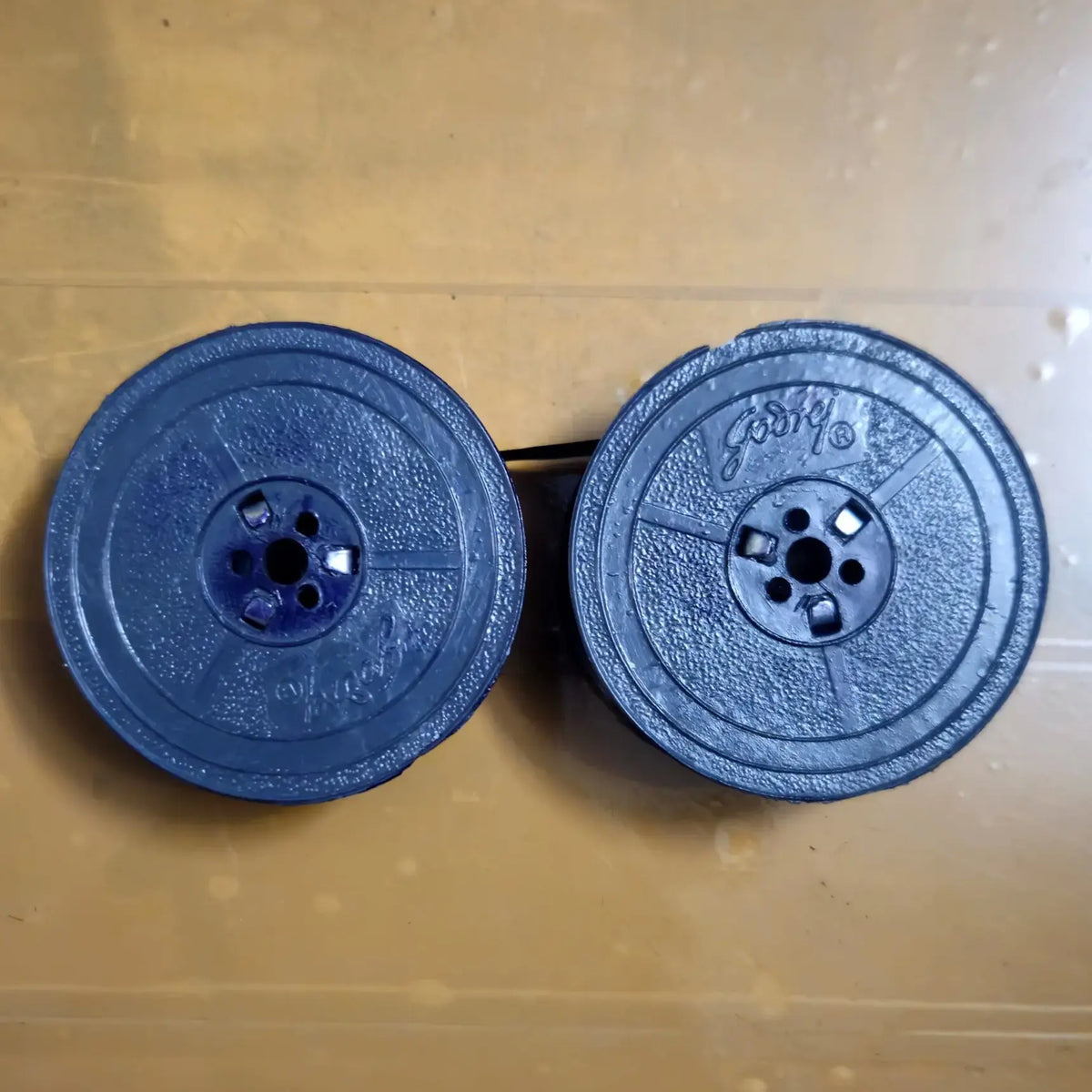 Top view of purple typewriter ribbon spool set, RR Typewriter Mart typewriter ribbon shop and store