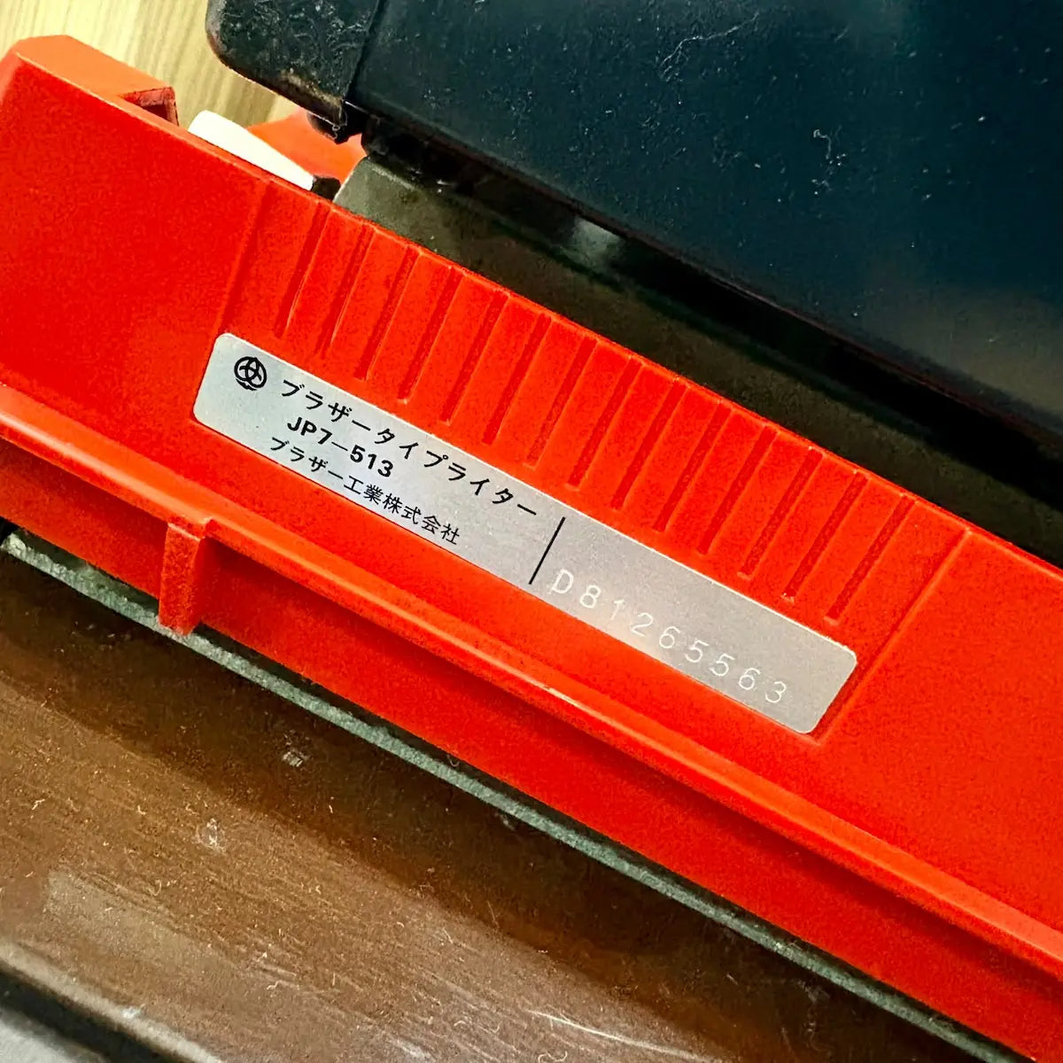 Scarlet red Brother Young Elite 513 typewriter with English keyboard, detailed angled view for vintage typewriter buyers | RR Typewriter Mart