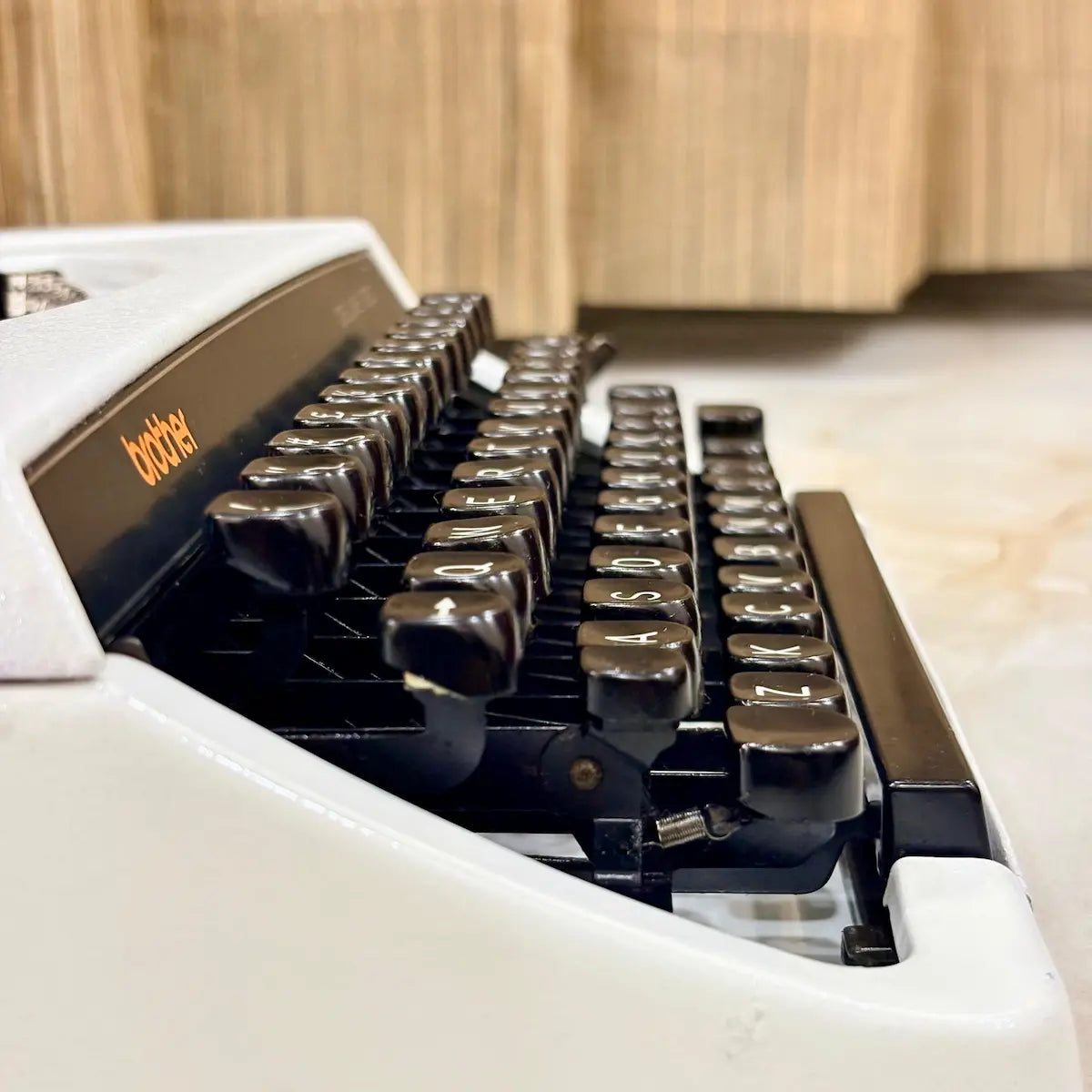 Brother 220 Deluxe Pearl White vintage typewriter, portable mechanical QWERTY typewriter available from RR Typewriter Mart India