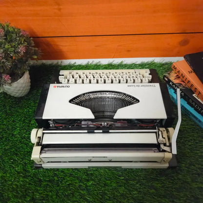 Brand New Olympia Traveller Deluxe Typewriter