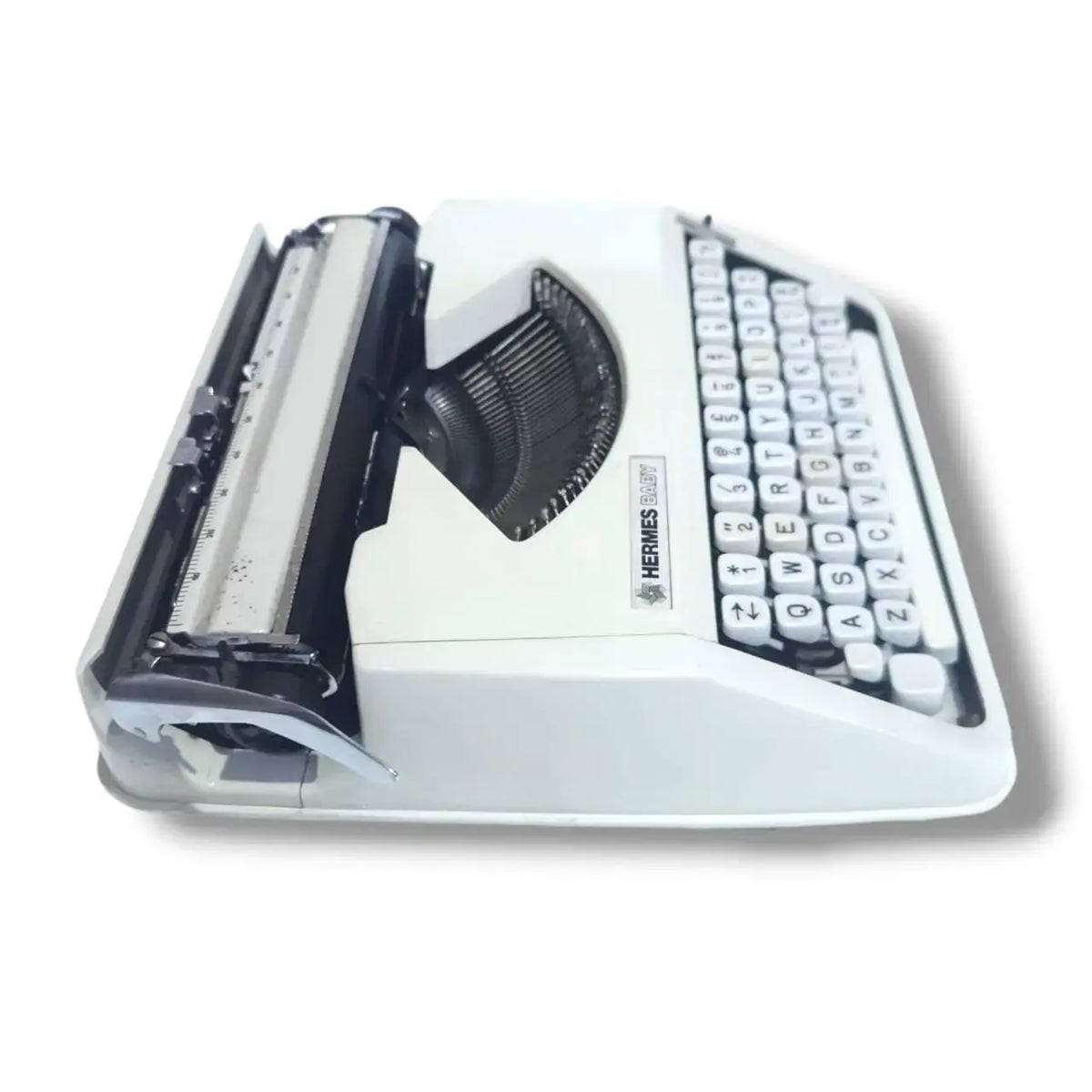 Side profile Hermes Baby typing machine, portable imported typewriter from RR Typewriter Mart India