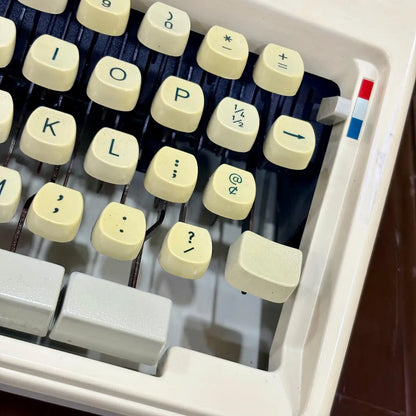 Royal Junior manual English typewriter close-up of cream QWERTY keys and red controls, from RR Typewriter Mart.