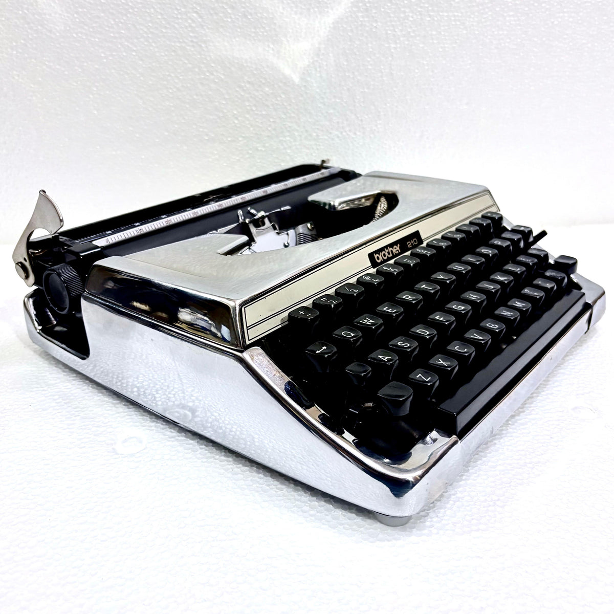 Mirror chrome Brother 210 English typewriter ready to write, restored by RR Typewriter Mart for collectors