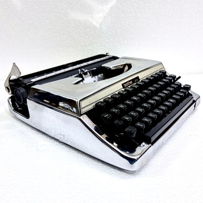 Mirror chrome Brother 210 English typewriter ready to write, restored by RR Typewriter Mart for collectors