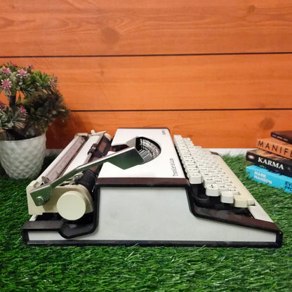 Brand New Olympia Traveller Deluxe Typewriter
