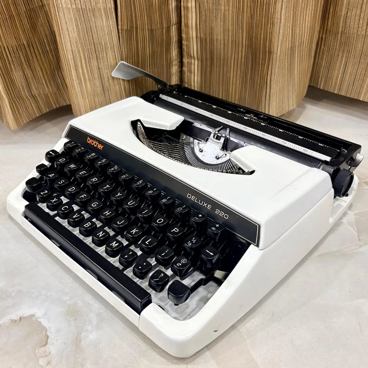 Brother Deluxe 220 Pearl White portable typewriter, manual mechanical typewriter restored by RR Typewriter Mart for writers in India
