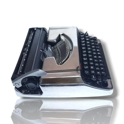 Brother 220 Deluxe Chrome Portable Typewriter