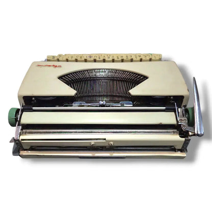 Back view Olympia manual English typing machine with exposed carriage from RR Typewriter Mart seller