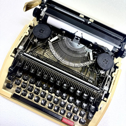 Brother Deluxe 750TR Arabic typewriter with Arabic script keys, compact portable body and restored mechanical construction for India