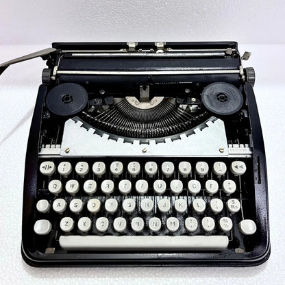 Black Shadow portable typewriter by Hermes Baby, vintage manual writing machine, RR Typewriter Mart from Delhi