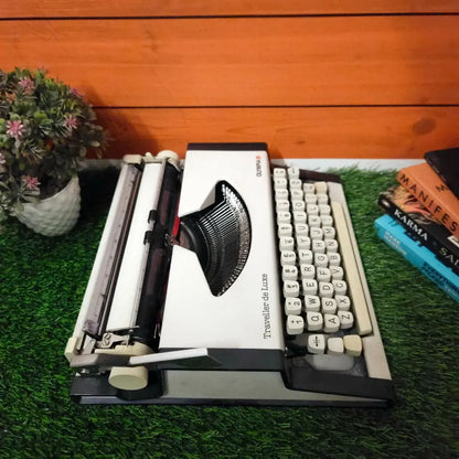 Brand New Olympia Traveller Deluxe Typewriter