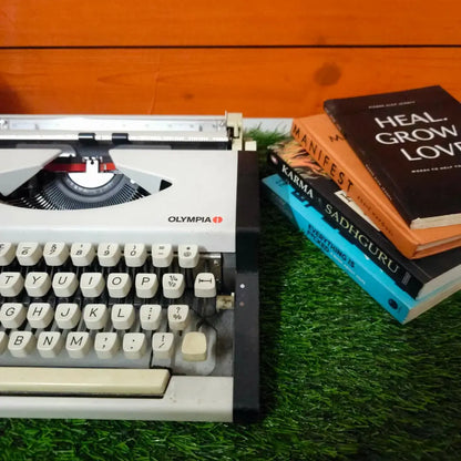 Brand New Olympia Traveller Deluxe Typewriter