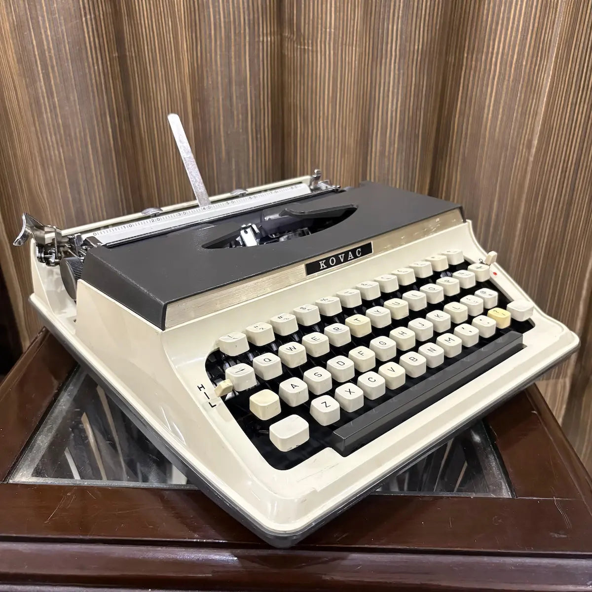 Kovac typewriter in mint condition with factory original grey upper panel, ivory white body and contrasting cream keys | RR Typewriter Mart