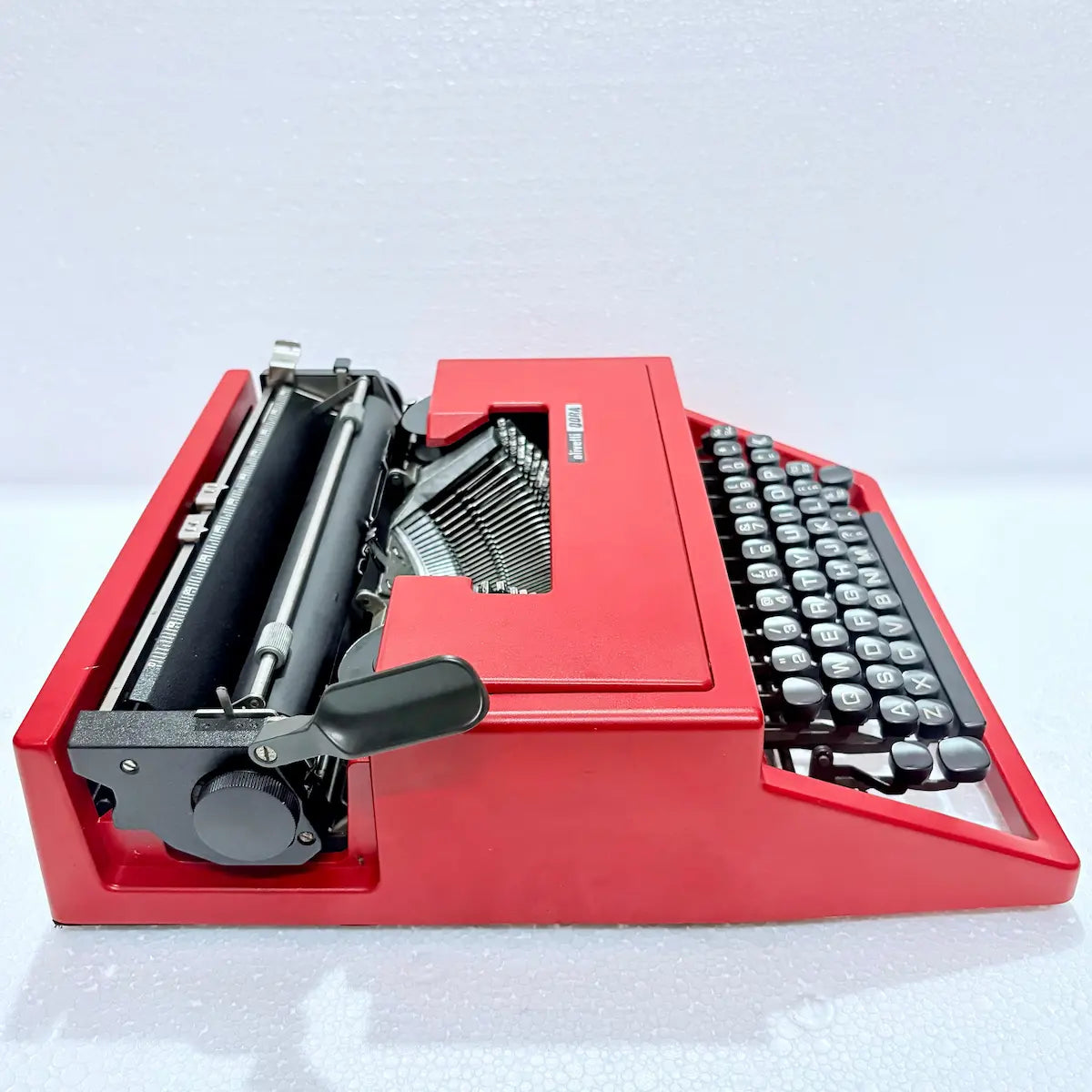 Classic red Olivetti Dora typewriter, vintage manual mechanical typing machine, RR Typewriter Mart India online