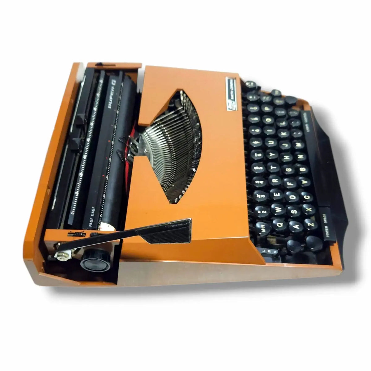 Orange manual English typewriter with black keys vintage Corona typewriter collectors machine