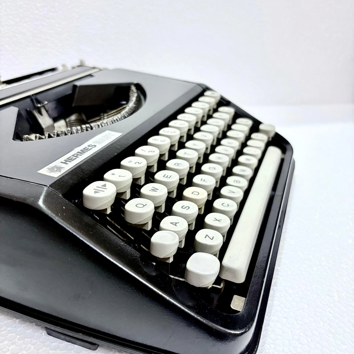 Black Hermes Baby portable manual typewriter, vintage typing machine for writers, RR Typewriter Mart from Delhi
