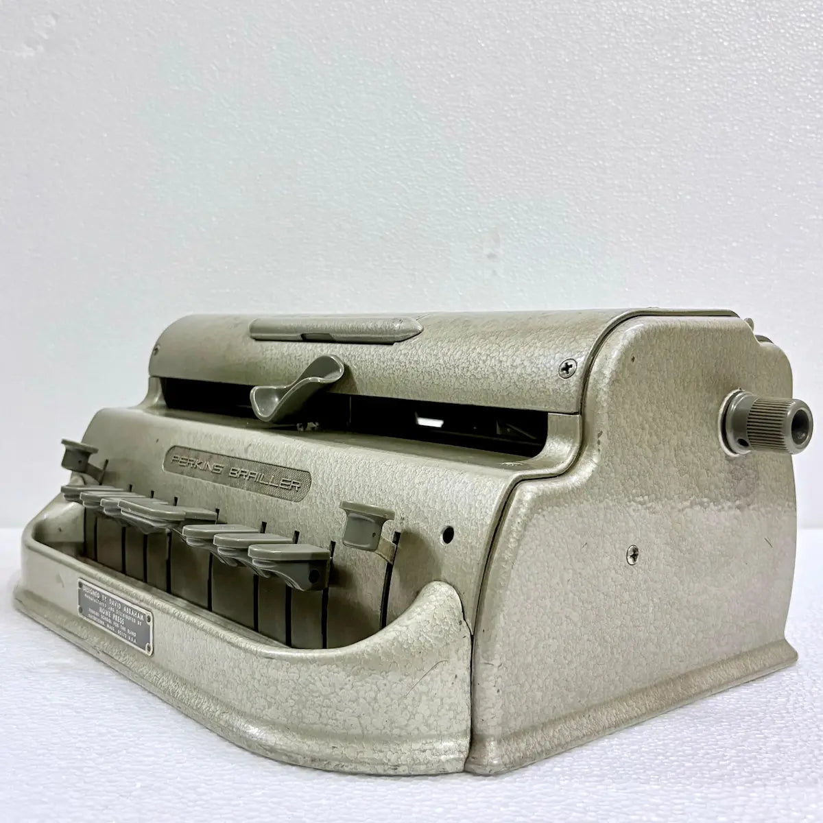 Braille Typewriter shop in India offering a professionally serviced Perkins Brailler with its distinctive original gold finish at RR Typewriter Mart
