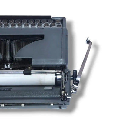 Three-quarter view Royal portable typewriter in grey – buy vintage typing machine RR Mart