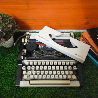 Brand New Olympia Traveller Deluxe Typewriter