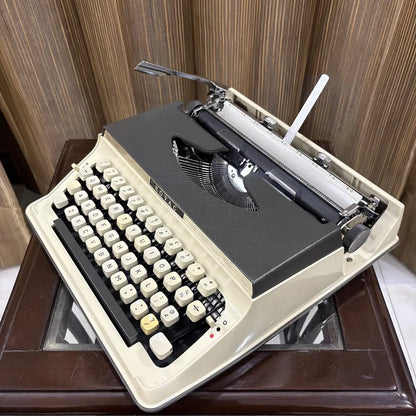 Kovac M-101A portable English typewriter with cream keys and original factory finish, preserved as never typed old stock | RR Typewriter Mart