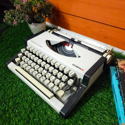 Brand New Olympia Traveller Deluxe Typewriter