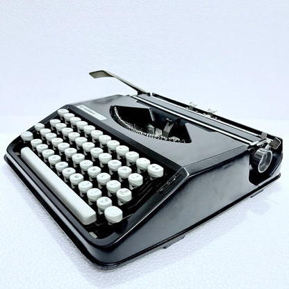 Hermes Baby Black Shadow English typewriter, compact manual writing machine, RR Typewriter Mart for collectors