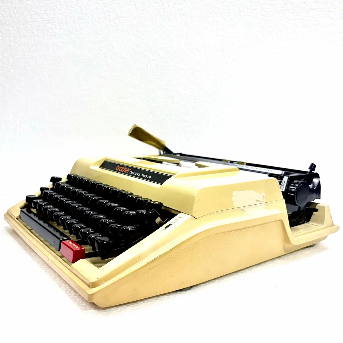 Arabic Brother 750TR mechanical typewriter with black Arabic keyboard, cream body and portable hard carrying case, restored for use