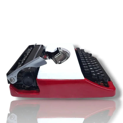 Brother Deluxe 220 Swiss Portable Typewriter
