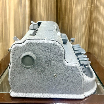 Detail of the Perkins Brailler side housing and adjustment knob, showing mint factory condition at RR Typewriter Mart in India today.