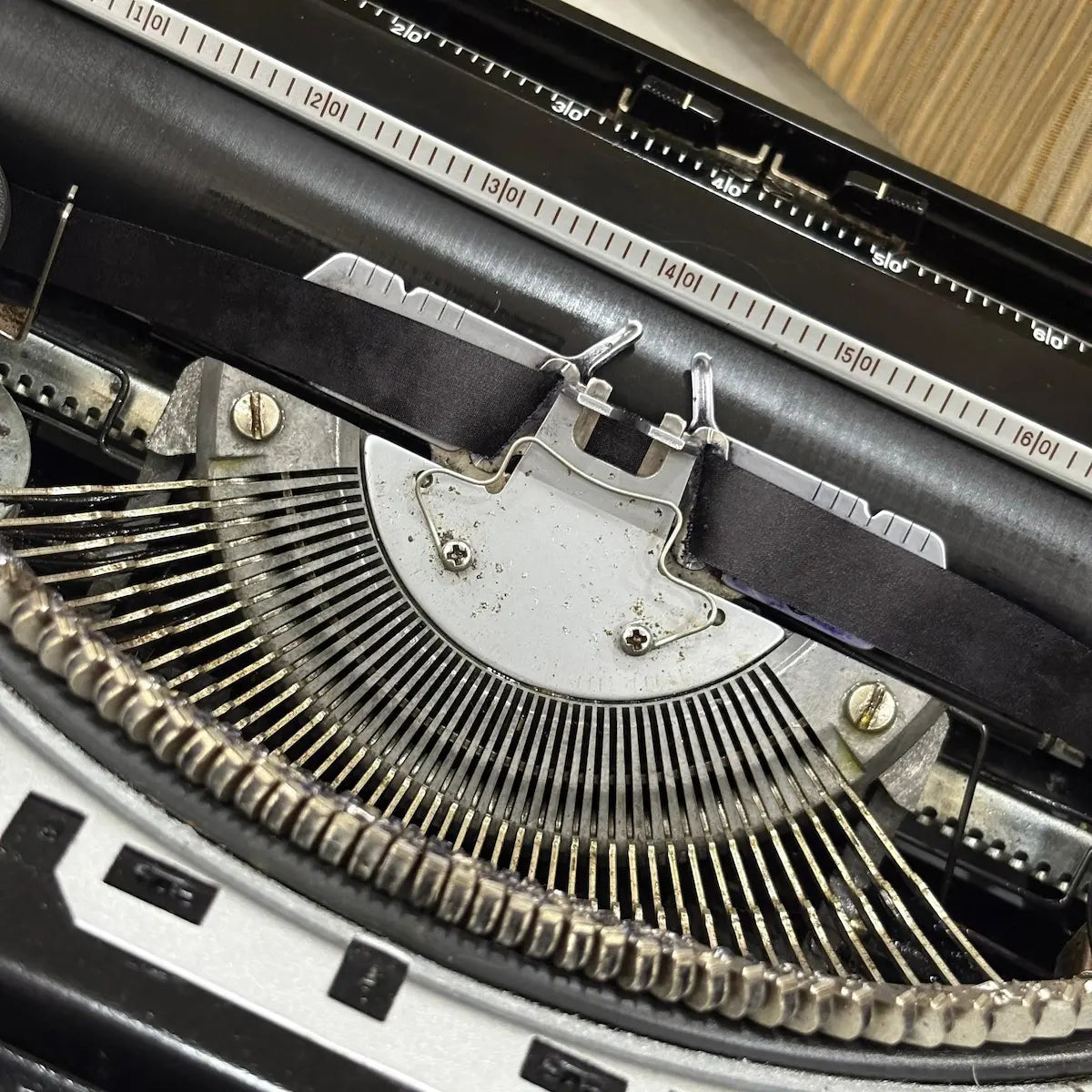 Brother 220 Deluxe typewriter in Pearl White finish with QWERTY keyboard and portable mechanical construction from RR Typewriter Mart