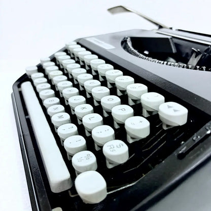 Hermes Baby Black Shadow manual English typing machine, vintage portable typewriter, RR Typewriter Mart online