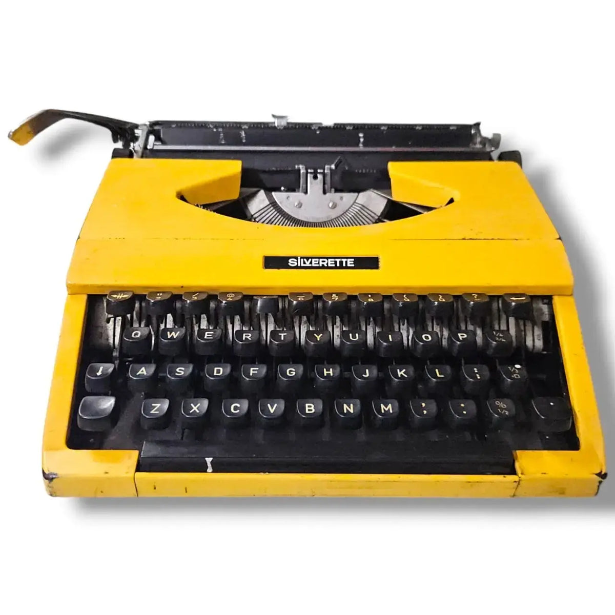 Bright yellow Silver Reed typewriter front view, Manual English Typewriter by RR Typewriter Mart seller