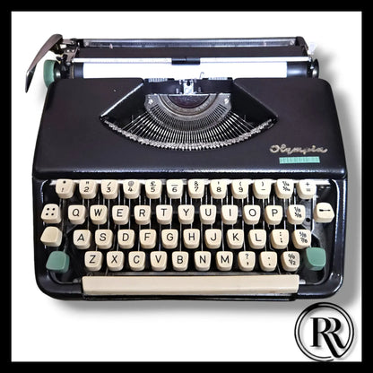 Black Olympia Splendid 33 Manual English Typewriter by RR Typewriter Mart, portable writer machine for sale