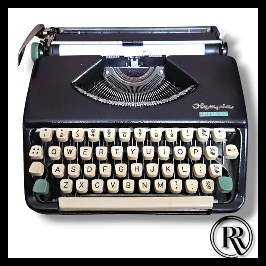 Black Olympia Splendid 33 Manual English Typewriter by RR Typewriter Mart, portable writer machine for sale