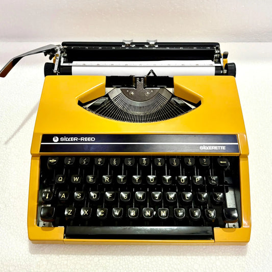 Mustard yellow Silver Reed Typewriter, Manual English Typewriter for buy typewriter at RR Typewriter Mart