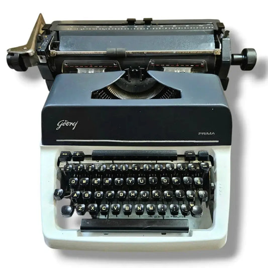 Front view Godrej English Typewriter showing carriage, manual English typing machine from RR Typewriter Mart