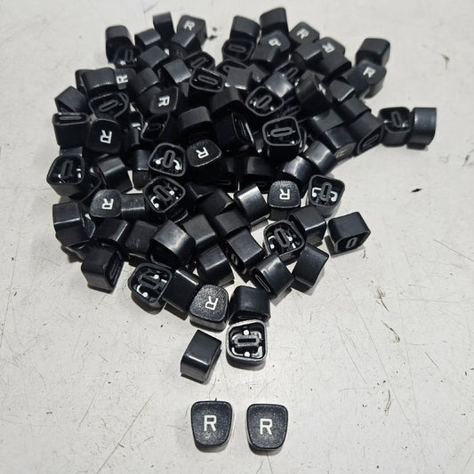Black Godrej English R typewriter loose keytops for manual typewriter restoration and spare parts replacement