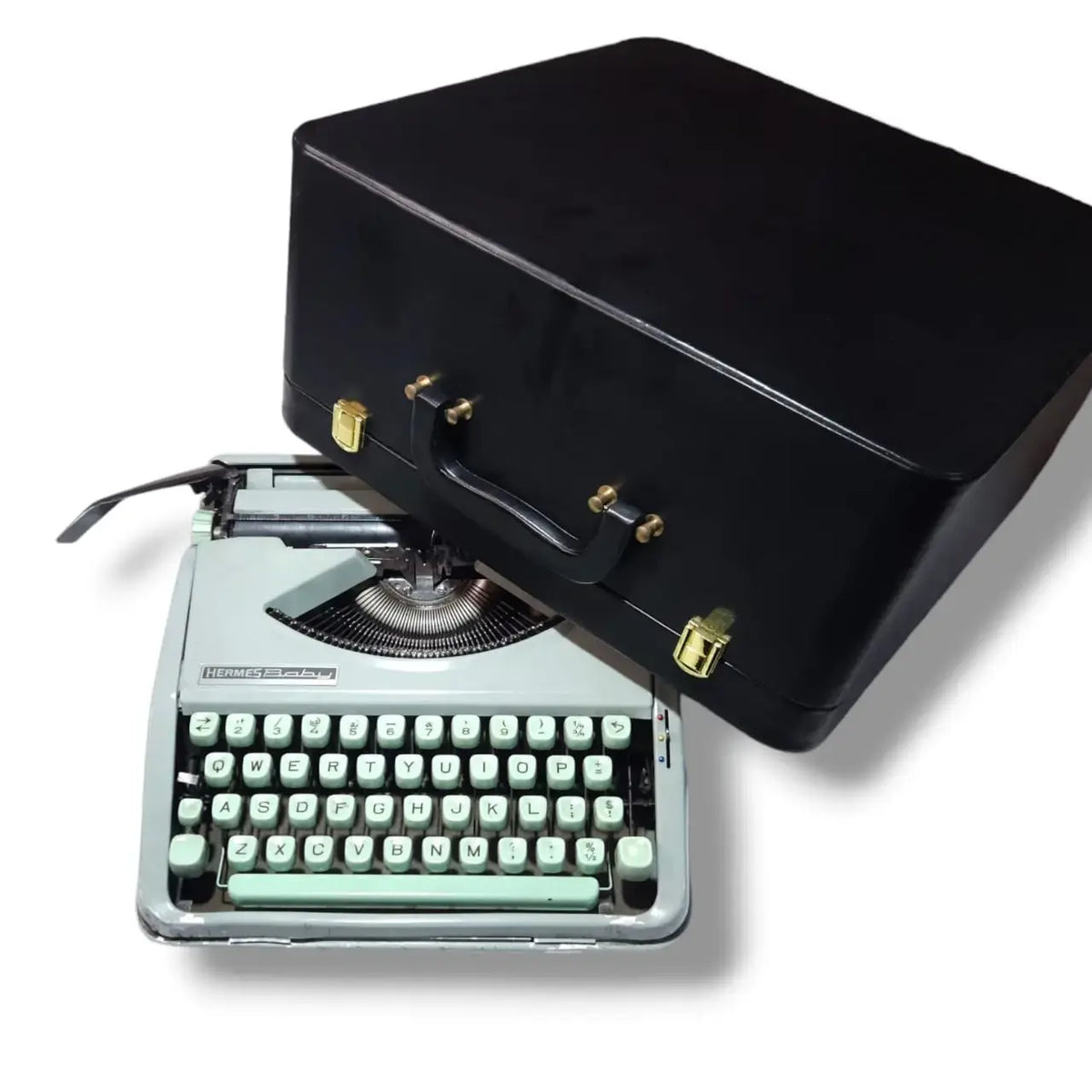 Hermes Baby Typewriter with black carry case, imported manual English typewriter from RR Typewriter Mart