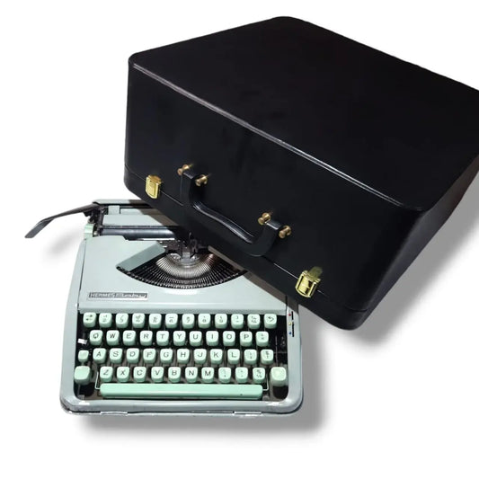 Hermes Baby Typewriter with black carry case, imported manual English typewriter from RR Typewriter Mart