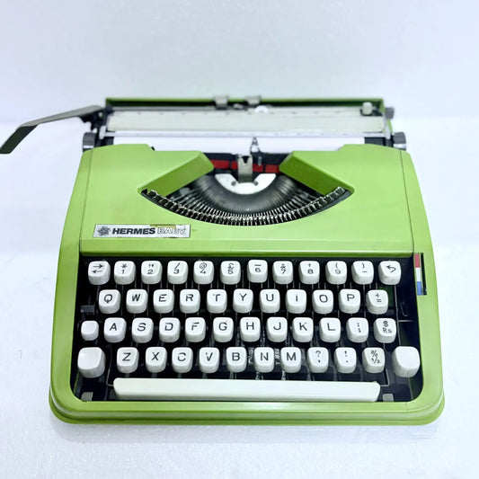 Hermes Baby cursive typewriter for smooth writing and vintage typing experience from RR Typewriter Mart