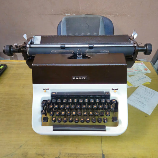 Facit 1720 manual English typewriter front view in original brown ivory finish, RR Typewriter Mart