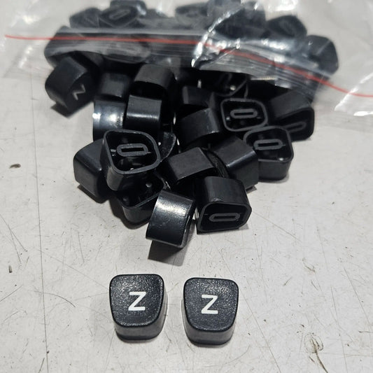 Black Godrej English Z typewriter loose keytops for manual typewriter repair, restoration and typing machine spare parts