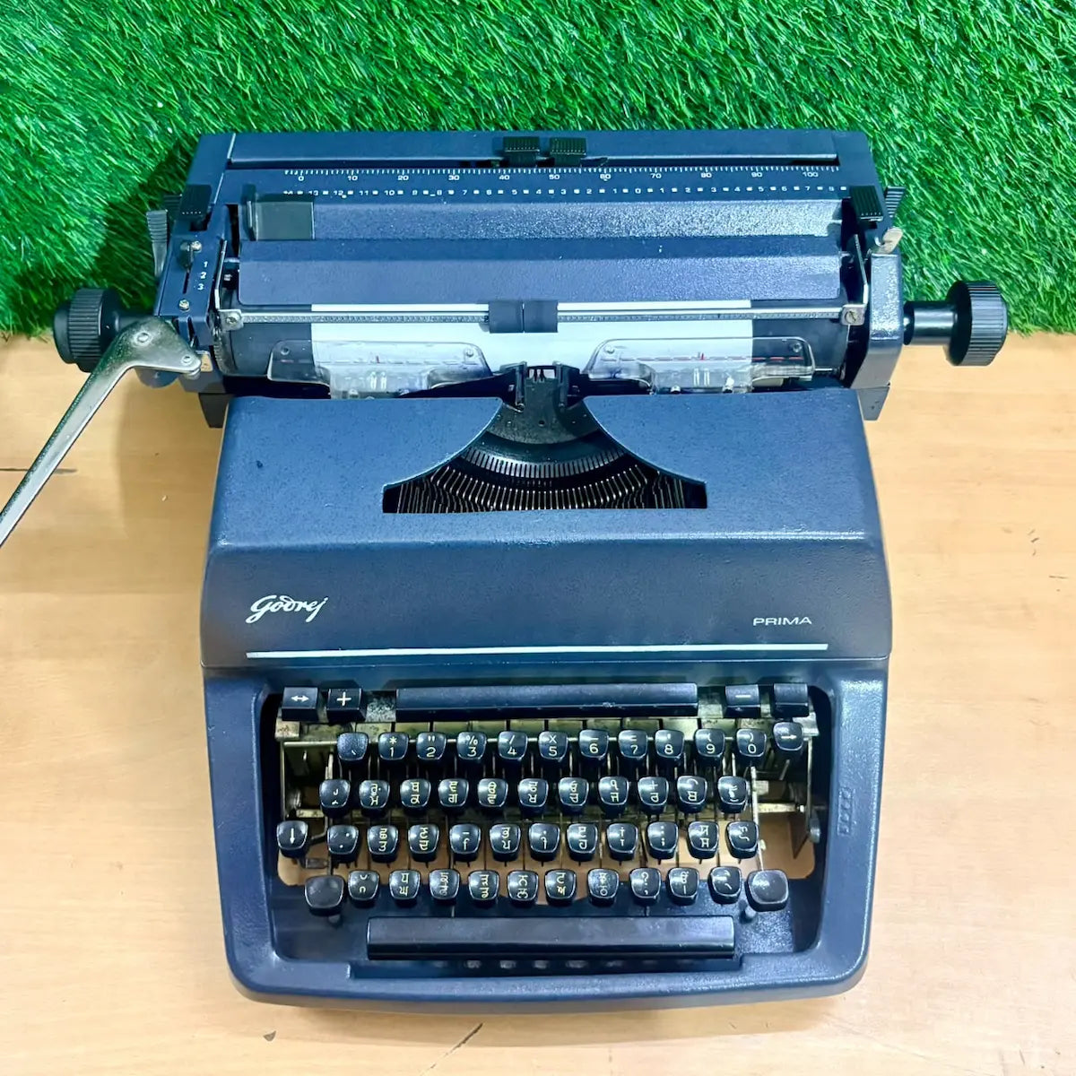 Godrej Prima Foolscap Punjabi Typewriter with Gurmukhi keyboard, front view and robust typing machine from RR Typewriter Mart