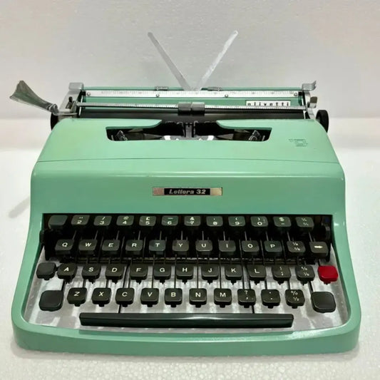Mint green Olivetti typewriter front view, manual English typing machine by RR Typewriter Mart, buy typewriter Delhi store